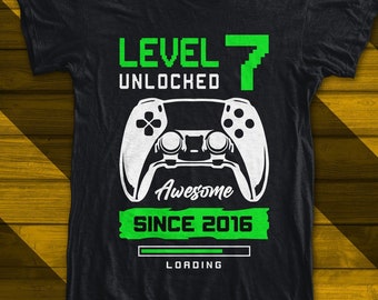 7th birthday svg , game controller , level unlocked svg , gamer birthday , birthday shirt , kids biorhtday svg