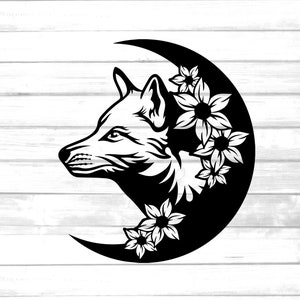 May include: Black and white silhouette of a wolf's head inside a crescent moon shape. The wolf's head is facing left and has detailed features. The crescent moon is decorated with stylized flowers.