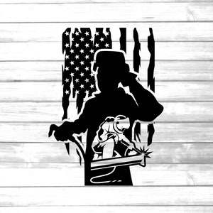 May include: A black silhouette of a welder with a welding torch in front of an American flag. The welder is wearing a welding helmet and gloves. The flag is distressed and has a grunge effect.