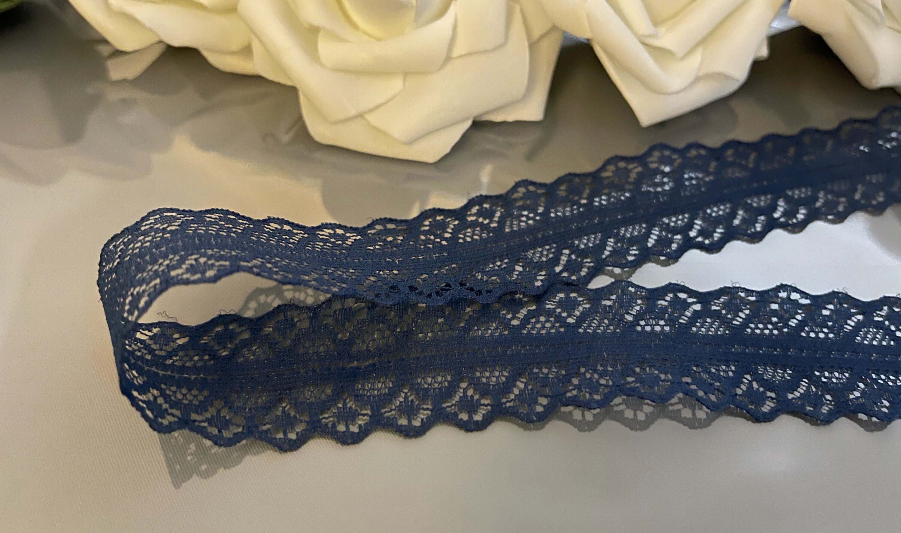 Navy blue lace roll online