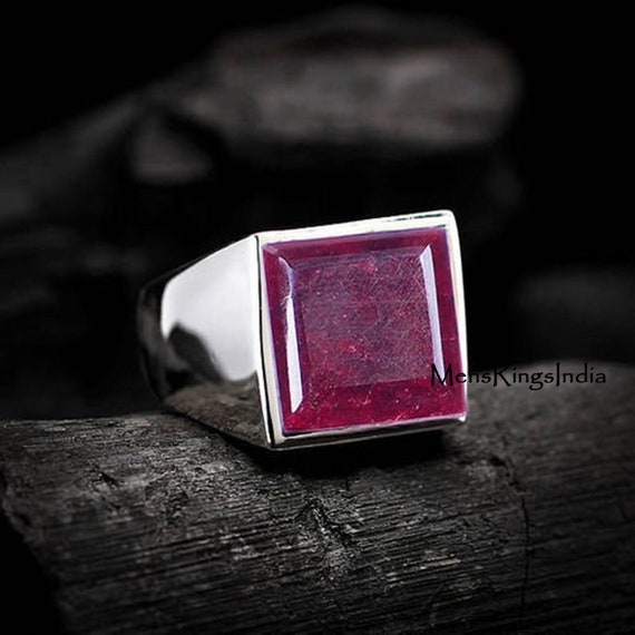 Bague grenat homme sale