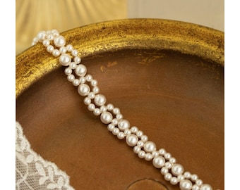 Tour de cou en perles d'eau douce à motifs faits à la main