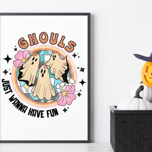 May include: A white poster with a colorful illustration of three ghosts with flowers and the text "Ghouls Just Wanna Have Fun".
