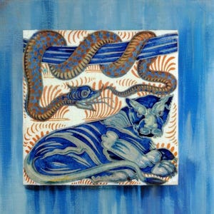 May include: A blue and white ceramic tile featuring a stylised image of a tiger and a snake. The tiger is lying down with its head turned to the side, and the snake is coiled around a branch above the tiger. The tile has a white background with orange and blue accents.