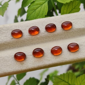 Natural Spessartine Garnet Cabochon 5.90x7.80 MM Oval Shape For Jewelry Making