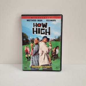 May include: A DVD case for the film How High featuring Method Man and Redman. The cover art displays the two main actors standing back-to-back against a green lawn and campus building background, with smaller figures of people in the distance.