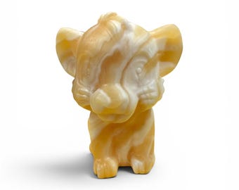Hand-Carved Orange Calcite Lion Cub Figurine – Polished Crystal Sculpture (4" Tall)