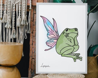 May include: A framed illustration of a green frog with pink and blue wings. The frog is sitting with its arms crossed and has a whimsical expression. The artwork is signed "Leiguel" in the bottom right corner.