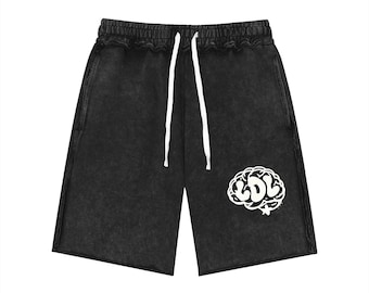 Pantalones cortos unisex con acabado lavado mineral y borde sin rematar.