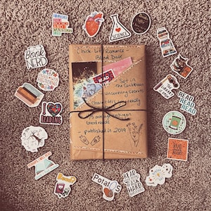 Blind Date With a Book | Choose Your Genre | Includes Bookmark, Hot Beverage, & Bookish Stickers | Surprise Reading Experience