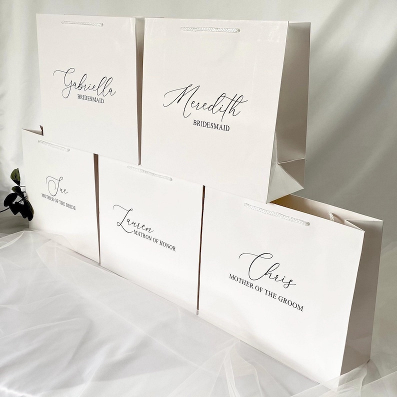 A customized gift bag for weddings, graduation, baby showers or any special occasion. Available in size small to extra large.