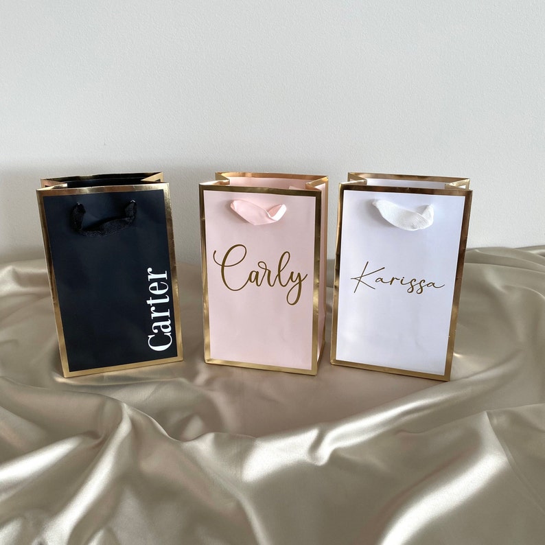 GIFT BAGS THAT ARE PERSONALIZED IN SMALL MEDIUM OR LARGE IN WHITE PINK OR BLACK