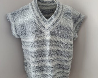 Hand knitted sleeveless tank. An ideal gift.