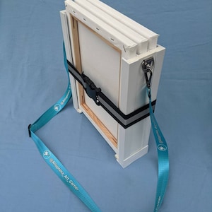 Allaprima Art Canvas Carrier. Carry your wet paintings safely. Light weight & adjustable to different sized paintings. Ideal for Plein Air.