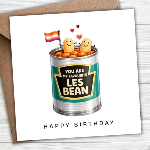 May include: A square greeting card featuring a cartoon illustration of a silver tin can filled with baked beans. Two smiling bean characters emerge from the top, one holding a lesbian pride flag. The label reads: YOU ARE MY FAVOURITE LES BEAN. HAPPY BIRTHDAY.