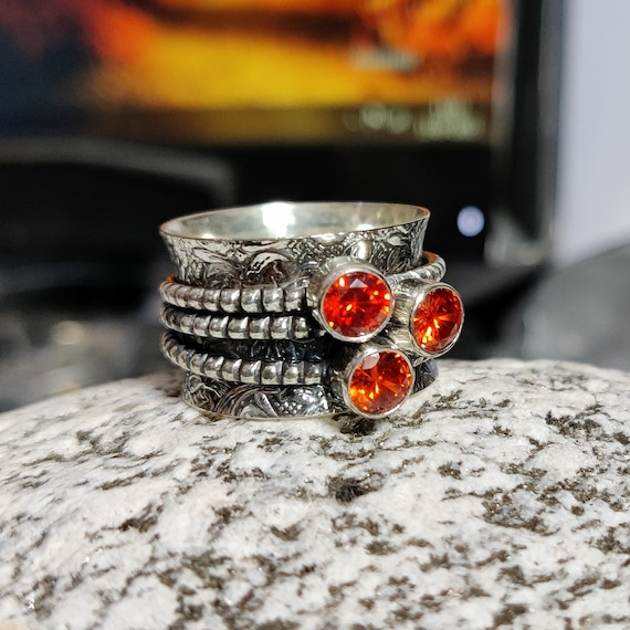 Garnet spinner ring deals