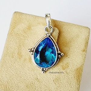 Handmade Sterling Silver Blue Topaz Pendant: Artisan Gemstone Jewelry