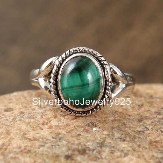 Solid malachite ring deals