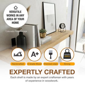 A light-coloured wooden shelf with a black frame, clock, and decorative items. The shelf is made of Colorado pine and supports up to 40 kg. Text on the image says "Versatile, Works in any area of your home" and "Expertly Crafted".