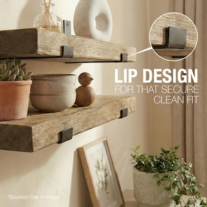 Two wooden shelves with a rustic finish are fixed to a wall with black metal brackets. The shelves display decorative items like a potted succulent, ceramic bowls, and a wooden bird. The image text says "LIP DESIGN FOR THAT SECURE CLEAN FIT."