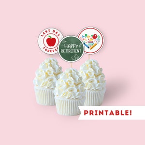May include: Three cupcakes with white frosting topped with round printable cupcake toppers. The toppers feature red and white polka dots, a red apple, the words "Last Day Forever", a green chalkboard with the words "Happy Retirement", and a red and white circle with a heart made of school supplies.