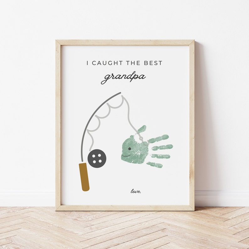 This is a Grandpa fishing handprint art digital download printable. At the top it says I caught the best grandpa in dark grey. Under is a fishing pole graphic with room for handprint fish & child's name. 3 sizes included: 8x10 inch, 8.5x11 inch, A4.