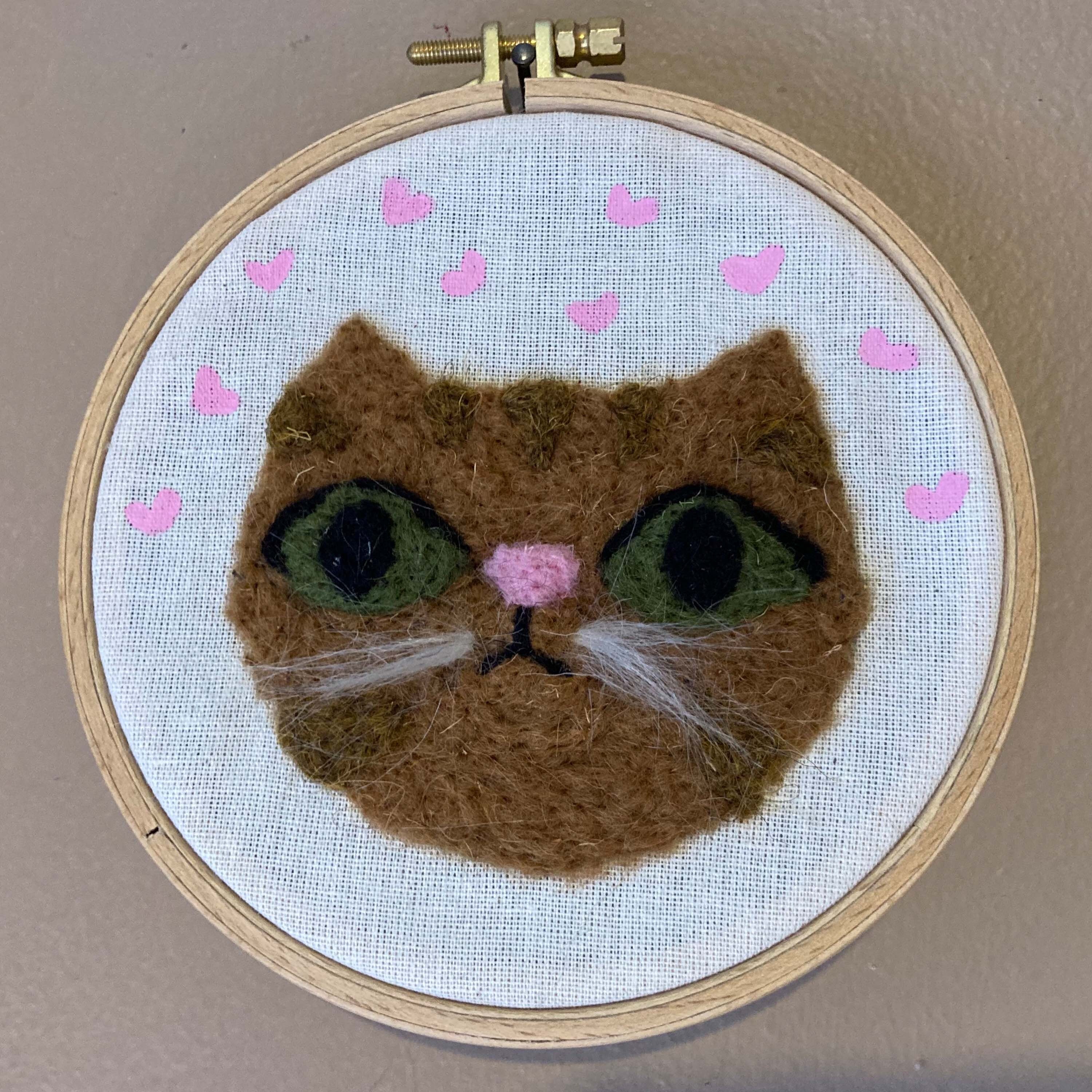 wool felt cat wall hanging in a 3 inch embroidery hoop 