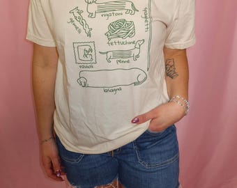 Camiseta divertida con estampado de perro salchicha y pasta, camiseta con diseño para amantes de la comida (corte vintage suave)