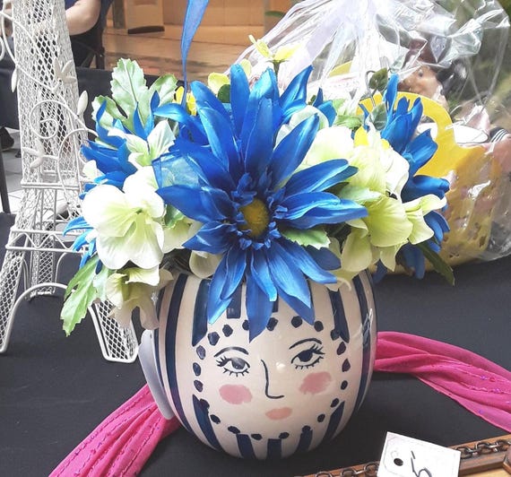 Face planter with faux floral