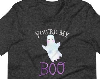May include: A dark heather grey t-shirt with the text "You're My Boo" in white and a cartoon ghost with purple accents.