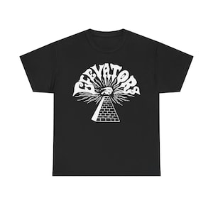 May include: Black t-shirt featuring a white graphic of the band "The Elevators" with a pyramid and an eye design.