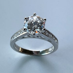 Sterling Silver CZ Solitaire Ring: Promise Wedding Band