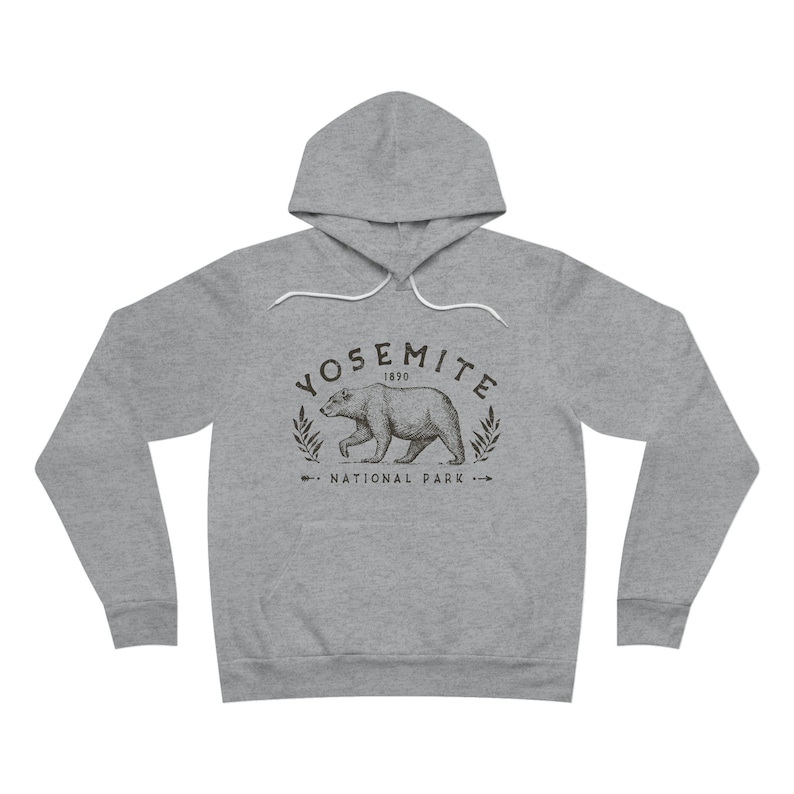 May include: A grey hooded sweatshirt with a black and white graphic print of a bear and the text "Yosemite 1890 National Park".