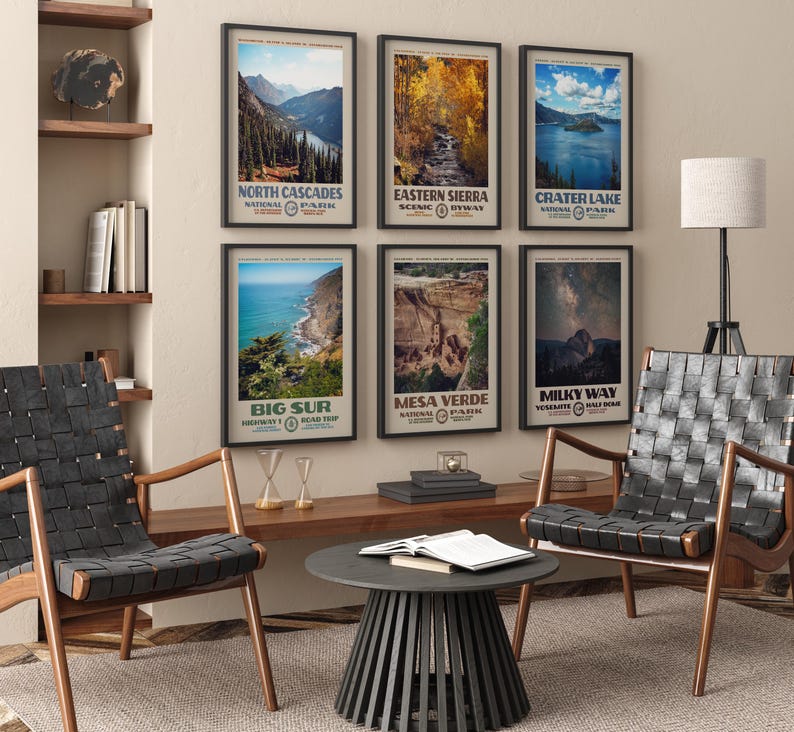May include: Six framed vertical wall art prints featuring landscape photography of North Cascades, Eastern Sierra, Crater Lake, Big Sur, Mesa Verde, and the Milky Way at Yosemite, each with bold text labels and a cream-colored border in black frames.