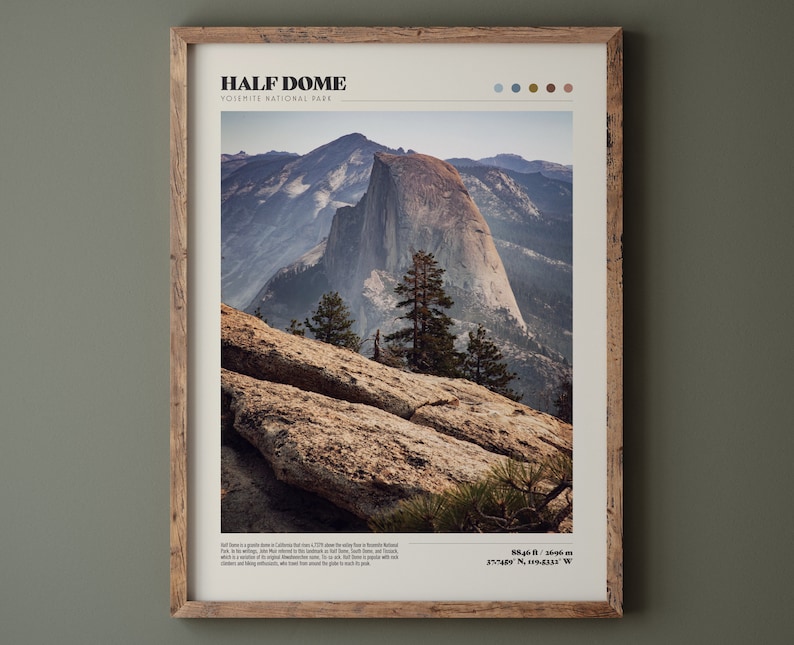 May include: A framed print featuring a photograph of Half Dome in Yosemite National Park. The image shows the iconic granite dome with surrounding mountains and trees. The print includes the text "HALF DOME" and "YOSEMITE NATIONAL PARK". The frame is made of wood.