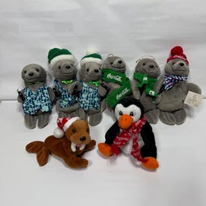 VINTAGE Lot of 8 Coca-Cola Christmas Bean Bag Plush Collective 1997 / 2 Have Tags.