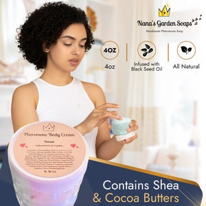 May include: A 4 ounce jar of pheromone body cream for women. The jar is pink and white with a gold crown on the lid. The label says "Pheromone Body Cream Female Androstenol & Copulins". The jar is sitting on a white surface. The background is a blurred image of a woman holding the jar.
