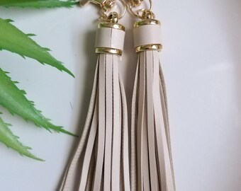 OFF-WHITE Faux Leather tassel// White handbag keyrings;