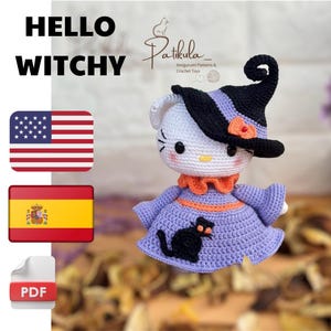 May include: Crochet pattern for a Hello Witchy amigurumi doll. The doll is a white cat wearing a purple dress, black witch hat, and orange bow. The pattern is available in English and Spanish.