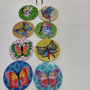 Posavasos de 8 piezas con diseño de mariposa y diseño de diamantes con soporte