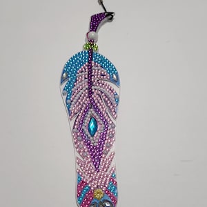 plastic feather bookmarkers