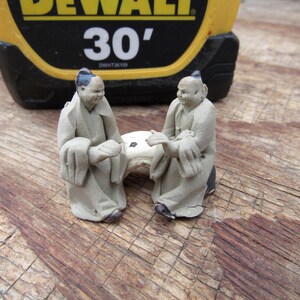 Friends Sitting Figurine