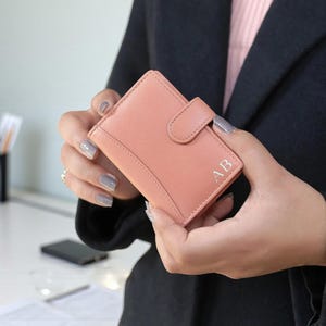Women using personalised rose leather RFID card holder wallet