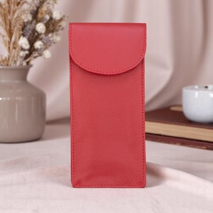 Double red leather glasses case designed to hold two pairs front view