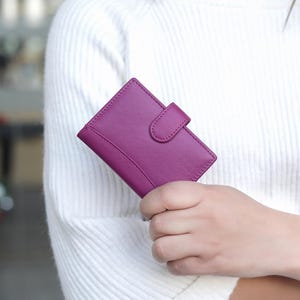 Women using personalised fuchsia leather RFID card holder wallet