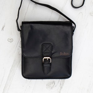 Men’s black leather satchel crossbody bag front view