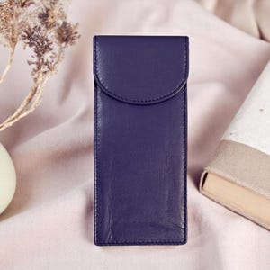 Double purple leather glasses case designed to hold two pairs front view