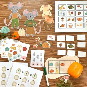 May include: A set of educational printable activity sheets for kids featuring a fall theme with pumpkins, mice, and numbers. The sheets include counting, addition, and matching activities.