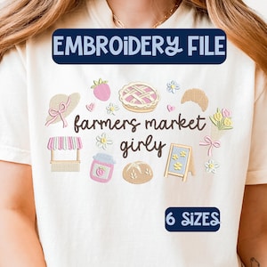 May include: Cream-colored t-shirt with an embroidered design featuring a straw hat, pie, flowers, and the words "farmers market girly." The text "EMBROIDERY FILE" and "6 SIZES" are also displayed.