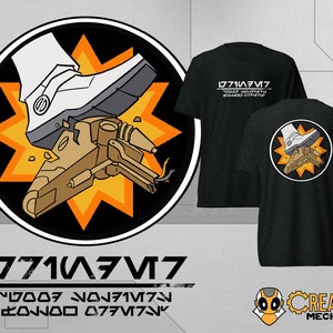 May include: A black t-shirt with a white and orange graphic of a boot stomping on a robot. The graphic is surrounded by a yellow starburst. The text "0771V377" is printed in white on the shirt. The text "V0007 N0771V73N 20N000 0771V73N" is printed in white below the graphic.